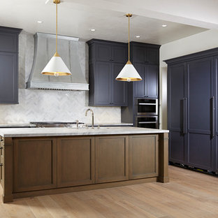 Photo of a mid-sized u-shaped kitchen in Miami with a drop-in sink, louvered cabinets, purple cabinets, marble benchtops, grey splashback, marble splashback, stainless steel appliances, light hardwood floors, with island and multi-coloured floor.