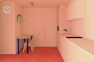 Diseño de cocina lineal pequeña abierta sin isla con fregadero encastrado, armarios con paneles lisos, encimera de azulejos, electrodomésticos con paneles, suelo de cemento, suelo rosa y encimeras rosas