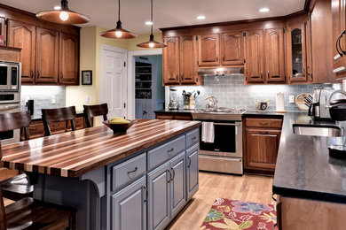 Example of a classic kitchen design in Other