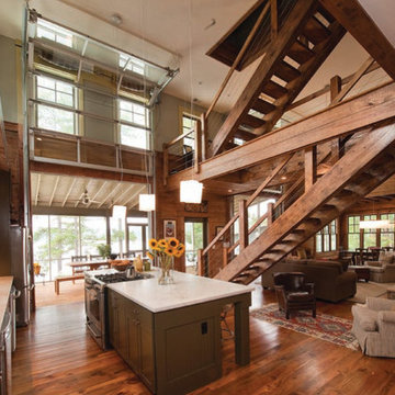 2 story space with glass garage style doors to the screened porch