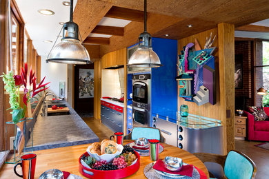 Example of an eclectic kitchen design in Other