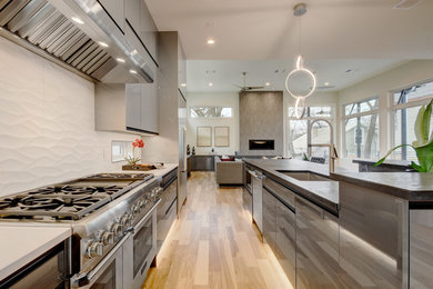 This is an example of a large contemporary kitchen in Austin.