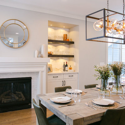 Example of a large transitional single-wall medium tone wood floor and brown floor eat-in kitchen design in Denver with an undermount sink, shaker cabinets, white cabinets, quartz countertops, multicolored backsplash, marble backsplash, stainless steel appliances, an island and white countertops