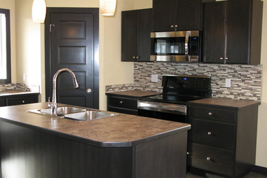 Example of a minimalist kitchen design in Calgary