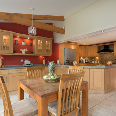Inspiration for a timeless eat-in kitchen remodel in Devon with shaker cabinets, light wood cabinets and stainless steel appliances