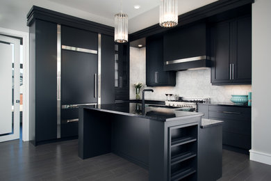 Inspiration for a mid-sized contemporary l-shaped dark wood floor and black floor eat-in kitchen remodel in Other with flat-panel cabinets, black cabinets, quartz countertops, gray backsplash, marble backsplash, black appliances and an island