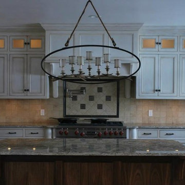 9' ceilings allowed us to add an upper row of lighted cabinets.
