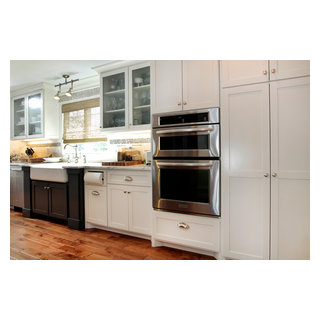 A chef's kitchen with cozy hearth room and spacious dining room