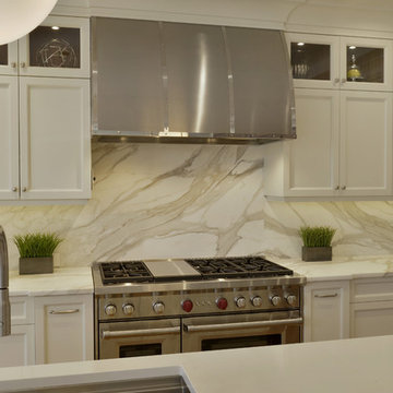 A Dramatic Marble Backsplash in a Transitional Kitchen
