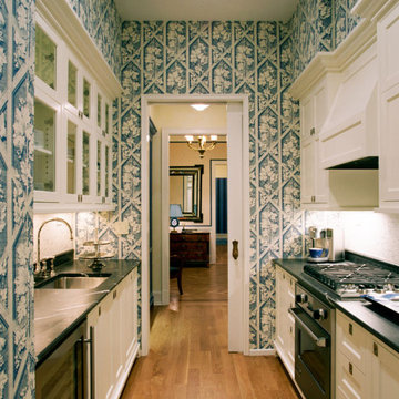 A kitchen with a pocket door
