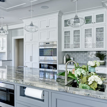 A Light Filled White Kitchen with Seafoam Accents