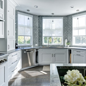A Light Filled White Kitchen with Seafoam Accents