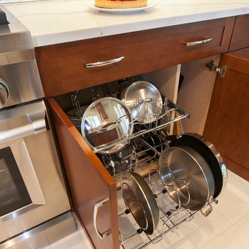 A Two-tier Cookware Pullout Keeps Pots & Pans Organized
