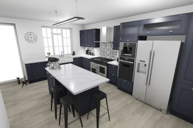 Design ideas for a medium sized traditional l-shaped kitchen/diner in London with a belfast sink, shaker cabinets, blue cabinets, engineered stone countertops, blue splashback, stainless steel appliances, medium hardwood flooring, an island, multi-coloured floors and white worktops.