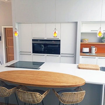 Add a splash of colour to a modern kitchen for a fun look with a retro feel