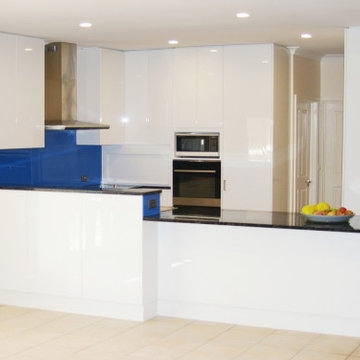 Adelaide Kitchen Renovation with Peacock Pearl Granite and White Two-Pack