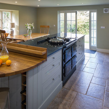 Aga cooker in an open plan traditional styled kitchen with shaker doors - Spille