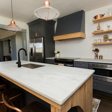 Alabama White Marble Countertops with Dark Blue Cabinets