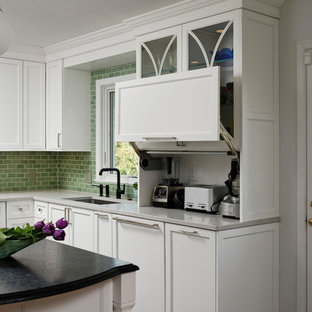 Mid-sized transitional kitchen ideas - Kitchen - mid-sized transitional porcelain tile and brown floor kitchen idea in DC Metro with a single-bowl sink, white cabinets, quartz countertops, green backsplash, ceramic backsplash, stainless steel appliances, an island, white countertops and recessed-panel cabinets
