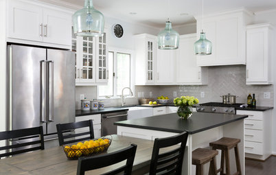 White Cabinets and Black Countertops Make a Winning Combination