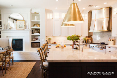 Eat-in kitchen - large transitional l-shaped dark wood floor and brown floor eat-in kitchen idea in Salt Lake City with a farmhouse sink, white backsplash, stone slab backsplash, stainless steel appliances, recessed-panel cabinets, white cabinets, quartzite countertops, an island and white countertops