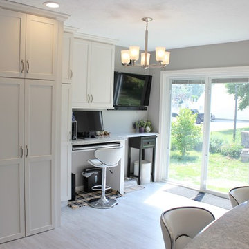 Alpha, IL White and Gray Kitchen with Hidden Laundry and Raised Dishwasher