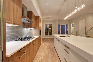 Photo of a modern kitchen in Calgary.