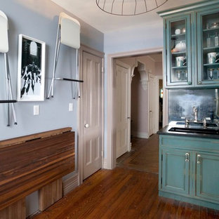 Eclectic kitchen designs - Inspiration for an eclectic kitchen remodel in New York with stainless steel appliances