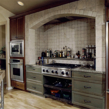 American River Drive a Kitchen with a unique designed alcove with rustic cabinet