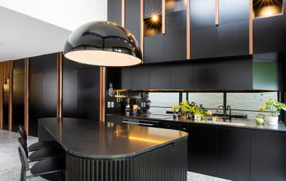 Room of the Week: A Black & Dramatic Kitchen with a Joinery Wall