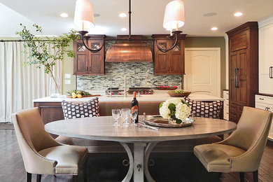 Eat-in kitchen - large traditional l-shaped dark wood floor eat-in kitchen idea in Baltimore with an undermount sink, flat-panel cabinets, dark wood cabinets, quartz countertops, paneled appliances, multicolored backsplash, matchstick tile backsplash and an island