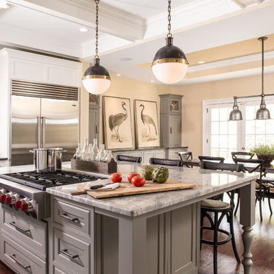 Inspiration for a transitional dark wood floor eat-in kitchen remodel in Atlanta with beaded inset cabinets, gray cabinets, white backsplash, stainless steel appliances and an island