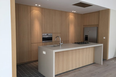 Example of a trendy kitchen design in Brussels