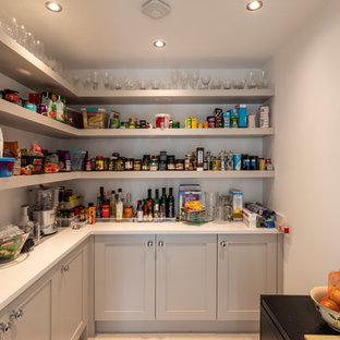 Medium sized classic l-shaped kitchen pantry in Cheshire with shaker cabinets, grey cabinets, quartz worktops, grey floors and white worktops.