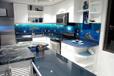 Large world-inspired l-shaped kitchen pantry in Hawaii with a built-in sink.