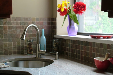 Transitional enclosed kitchen photo in Los Angeles with an undermount sink, granite countertops, multicolored backsplash and mosaic tile backsplash