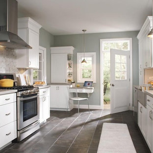 Traditional kitchen designs - Elegant kitchen photo in Other