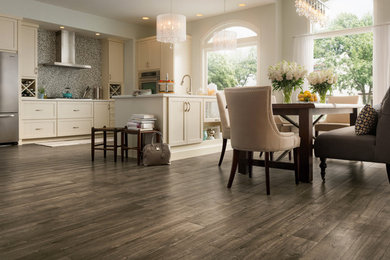 Inspiration for a large transitional l-shaped dark wood floor open concept kitchen remodel in Phoenix with recessed-panel cabinets, white cabinets, multicolored backsplash, mosaic tile backsplash, stainless steel appliances and an island