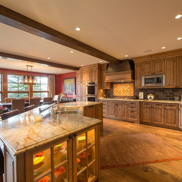 Open Concept Kitchen with Red Dining Room
