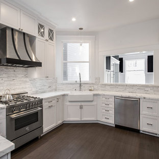 Mid-sized contemporary enclosed kitchen appliance - Example of a mid-sized trendy u-shaped porcelain tile and gray floor enclosed kitchen design in San Francisco with a farmhouse sink, raised-panel cabinets, gray cabinets, marble countertops, gray backsplash, marble backsplash and stainless steel appliances