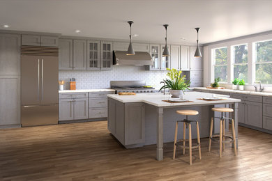 Immagine di una cucina moderna con ante in stile shaker e ante grigie