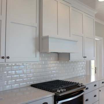 Aspen Homes- Midwest Minimalist White on White Kitchen