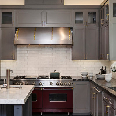 Trendy kitchen photo in San Francisco with colored appliances, subway tile backsplash, granite countertops, gray cabinets, white backsplash and recessed-panel cabinets