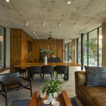 industrial modern living room with concrete walls