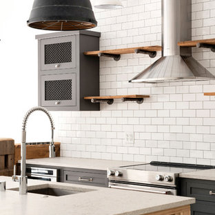 Industrial eat-in kitchen in Minneapolis with open cabinets, medium wood cabinets, white splashback, stainless steel appliances, with island, brown floor and yellow benchtop.
