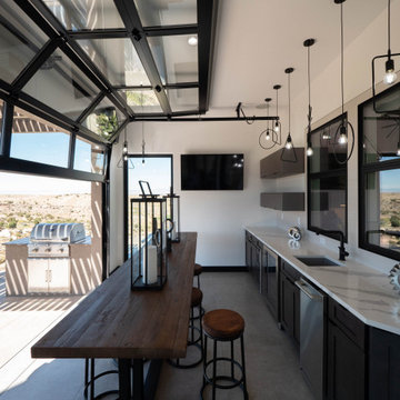 Award Winning indoor-outdoor Kitchen with Glass Garage Door