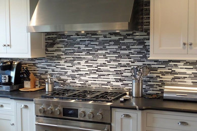 Kitchen - transitional kitchen idea in Other with white backsplash and glass tile backsplash