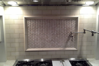 Example of a kitchen design in Philadelphia with mosaic tile backsplash