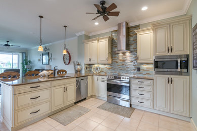 Elegant kitchen photo in Miami