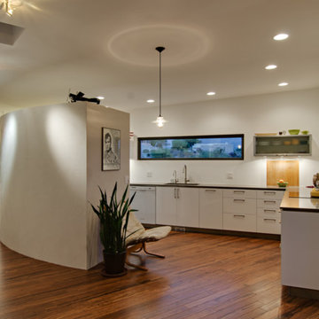 bamboo floor, white walls, open flow to defined spaces